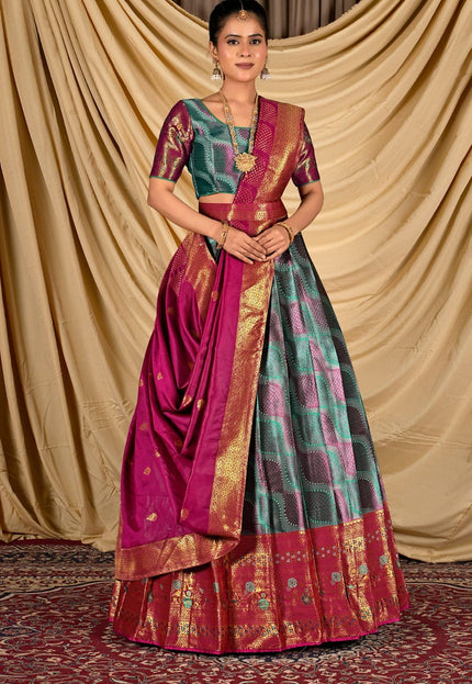 Woman wearing a traditional lehenga choli with a gold border