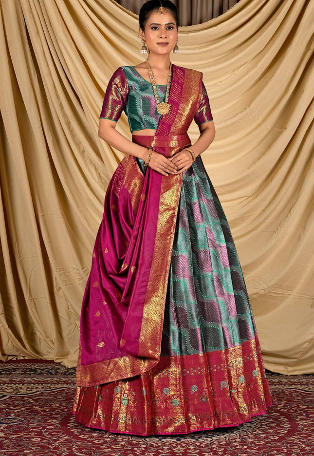 Woman wearing a traditional lehenga choli with a gold border
