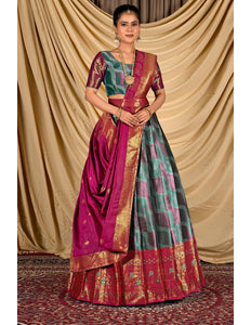 Woman wearing a traditional lehenga choli with a gold border