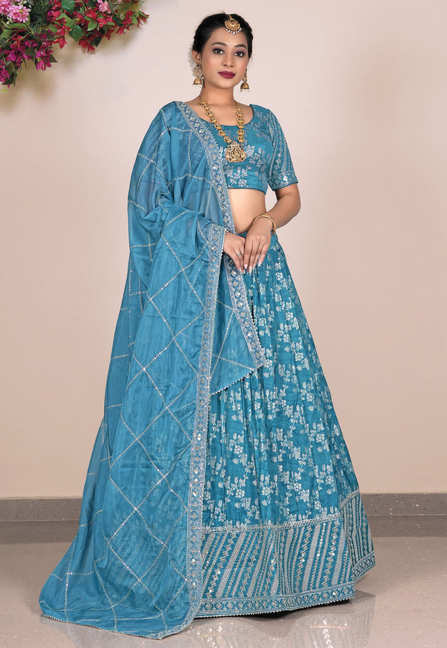 Woman wearing a blue embroidered with matching blouse
