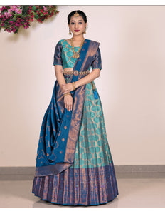 Woman wearing a blue and sea green lehenga