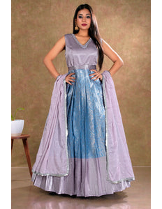 Woman wearing a two-tone dress with a gradient from blue to lavender