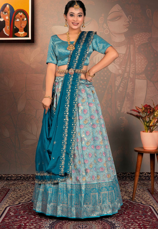 Woman in a sky blue traditional lehenga choli with dupatta