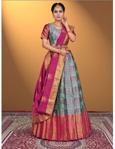 Woman wearing a traditional lehenga choli with a colorful pattern