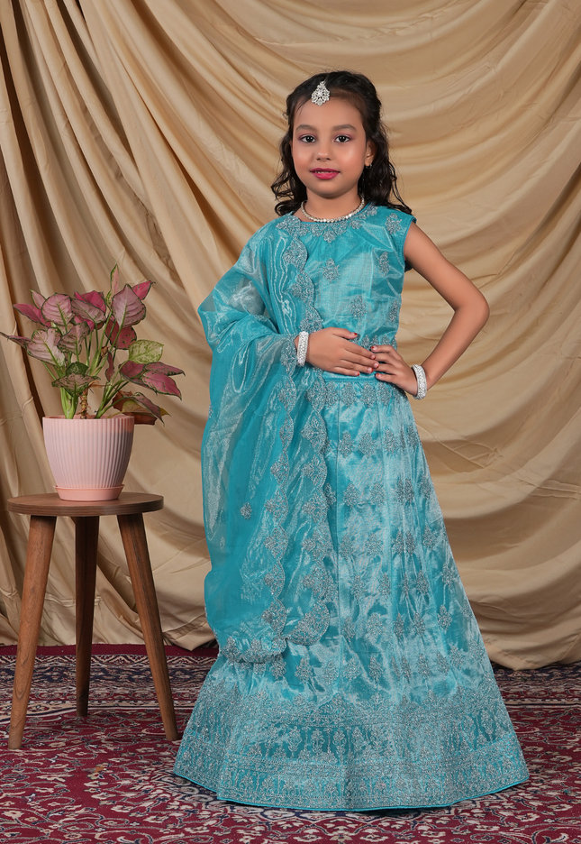 Young girl in a turquoise embroidered ready-made lehenga for girls