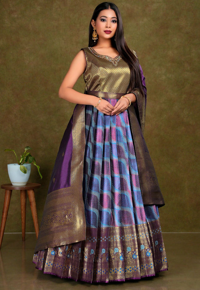 Woman wearing a traditional outfit with a sky blue multicolored gown