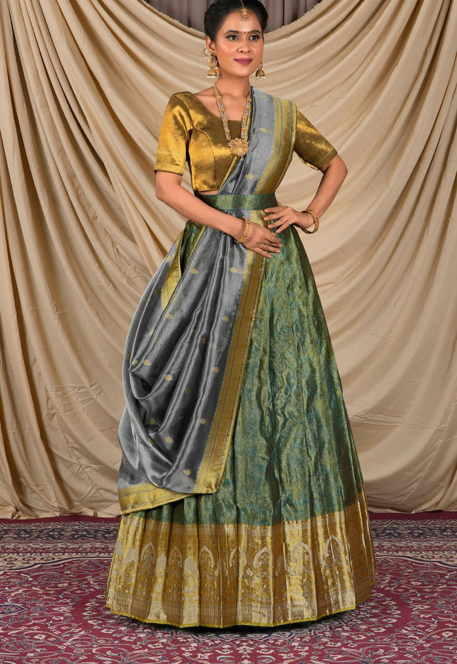 Woman wearing a traditional lehenga with a gold blouse