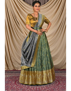 Woman wearing a traditional lehenga with a gold blouse