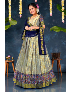 Woman in a traditional lehenga choli with floral patterns