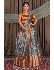 Woman in traditional lehenga with gold blouse