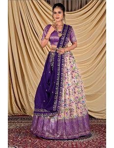 Woman wearing a traditional outfit with a purple blouse and floral skirt