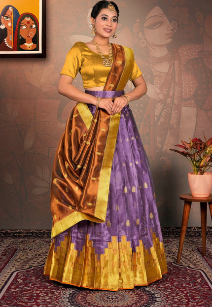 Woman in a yellow and purple traditional outfit