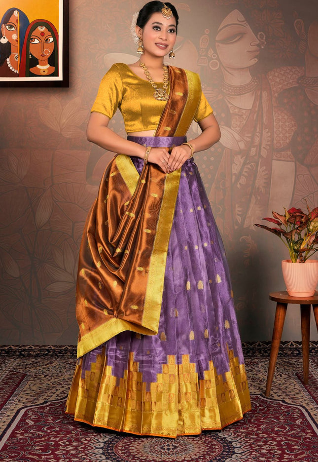 Woman in a yellow and purple traditional outfit