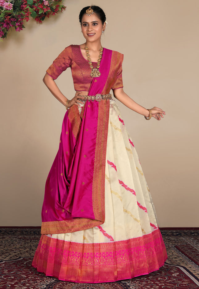 Woman wearing a traditional lehenga with pink and white design
