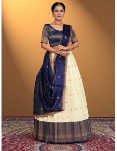 Woman wearing a traditional navy and white lehenga choli