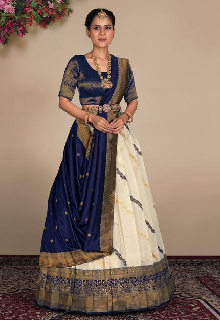 Woman wearing a traditional blue and white lehenga choli