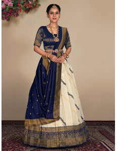 Woman wearing a traditional blue and white lehenga choli