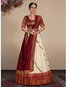 Woman wearing a traditional maroon and white lehenga choli