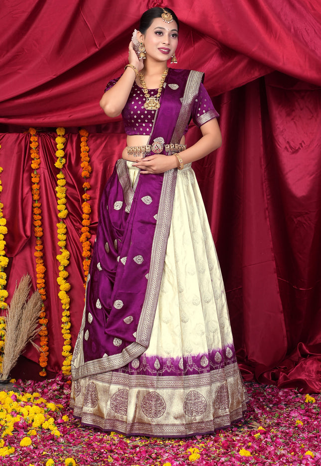 Woman in a traditional purple and white lehenga choli