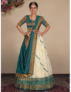 Woman wearing a traditional lehenga with a green blouse