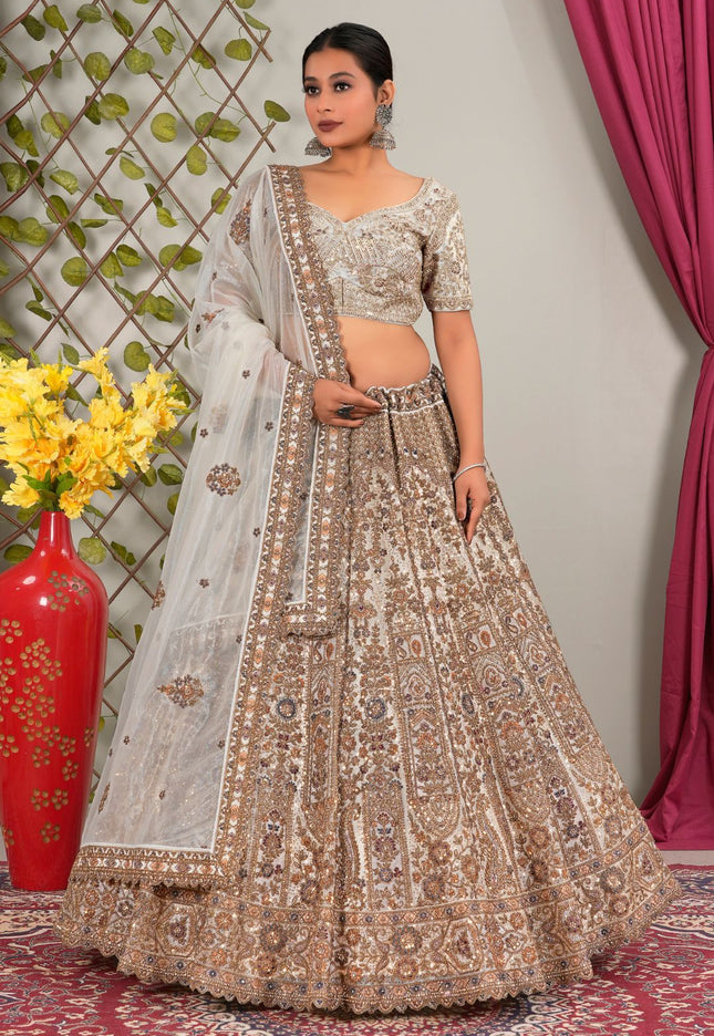 Woman in traditional purple embroidered lehenga choli with dupatta