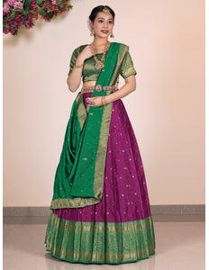 Woman Wearing a Green and Purple Lehenga Choli
