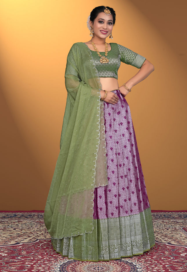 Woman wearing a green and purple traditional outfit