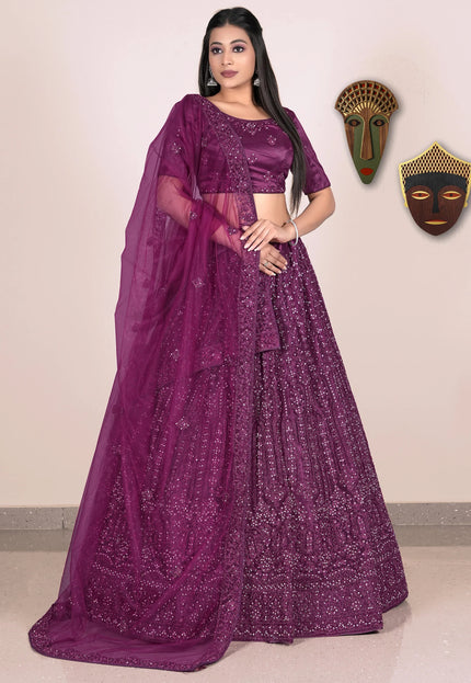 Woman wearing a purple traditional Lehenga Choli