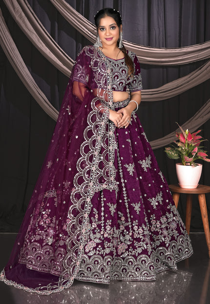 Woman in a purple embroidered traditional outfit