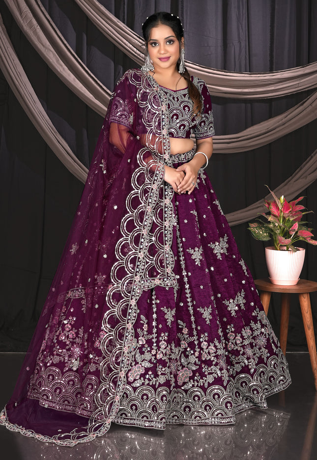 Woman in a purple embroidered traditional outfit