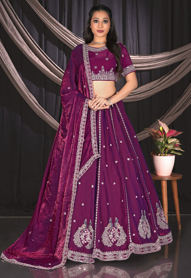 Woman wearing a purple embroidered traditional outfit
