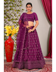 Woman wearing a purple traditional outfit