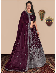 Woman in a Wine lehenga with silver patterns
