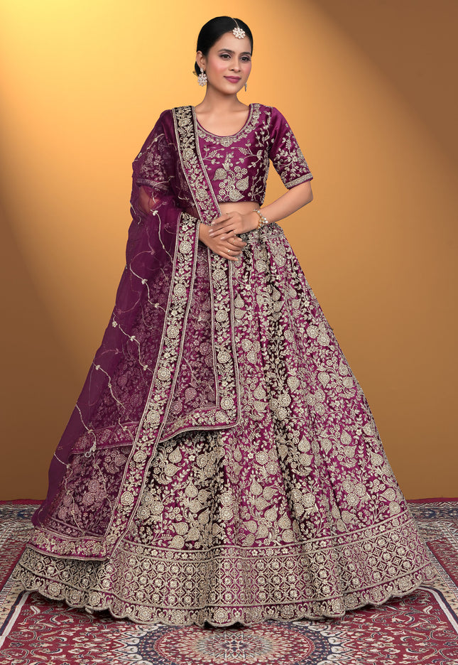 Woman wearing a traditional embroidered purple