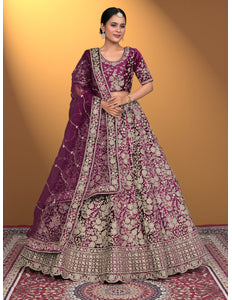 Woman wearing a traditional embroidered purple