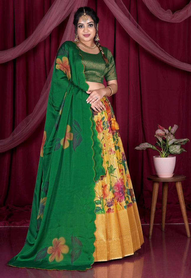 Woman in a green and yellow lehenga with floral patterns