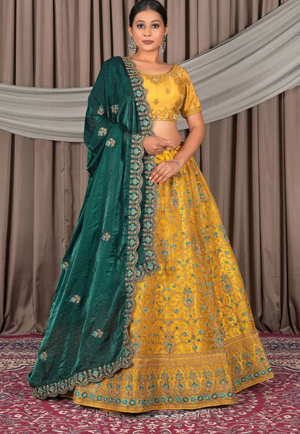 Yellow Wedding Wear Embroidered Net Lehenga Choli For Women